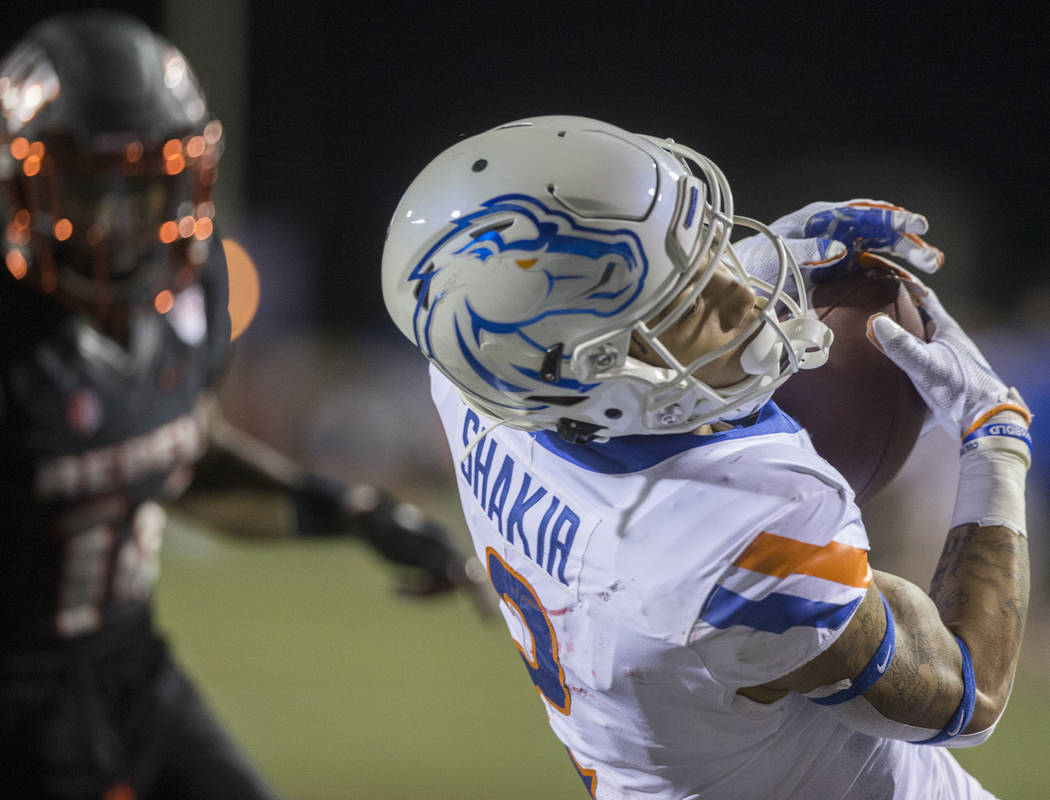 Boise State Broncos wide receiver Khalil Shakir (2) makes a touchdown catch over a UNLV defende ...