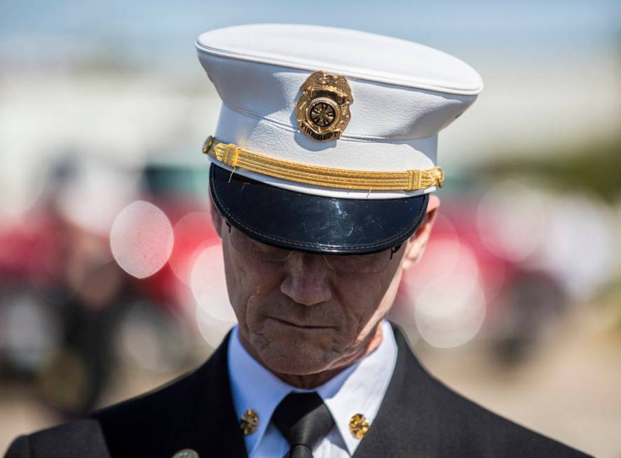 Henderson Fire Department Chief Shawn White waits for the motorcade to begin for Henderson Fire ...