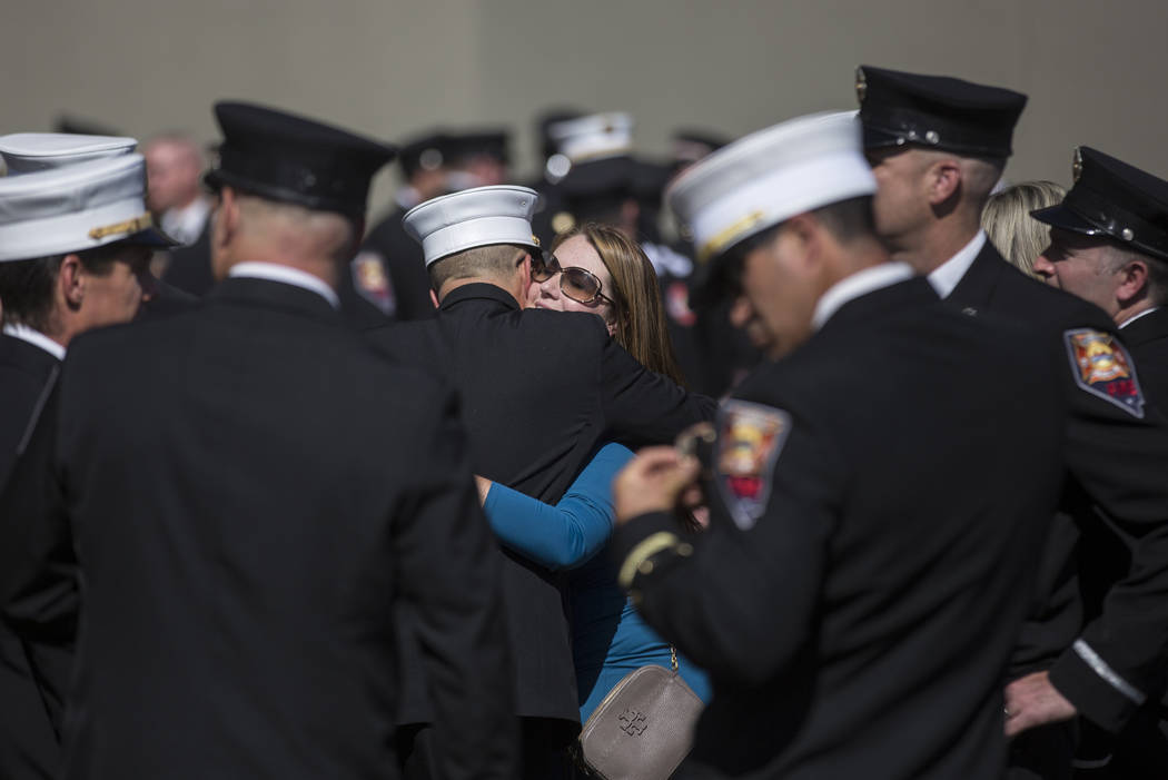 Friends and family of deceased Henderson Fire Department firefighter/paramedic Robbie James Pet ...