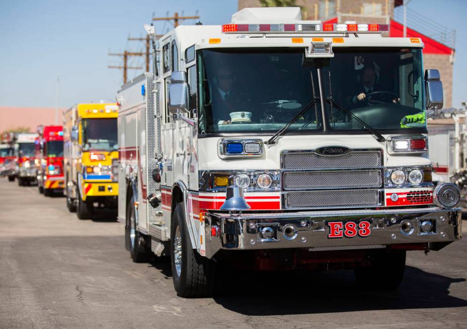 A motorcade of Henderson Fire and Police Department personnel escort the cremated remains of H ...