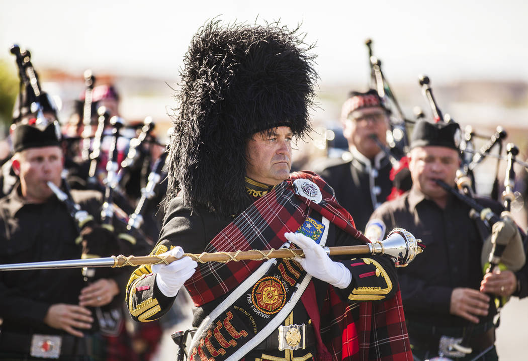 The procession for Henderson Fire Department firefighter/paramedic Robbie James Pettingill appr ...