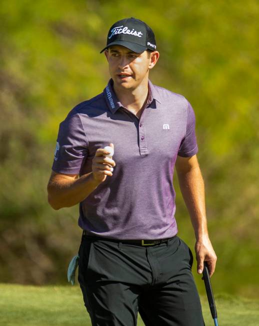 Patrick Cantlay looks to the gallery after a putt on hole 8 during the third round of Shriners ...