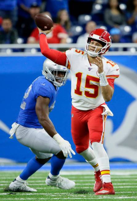 Kansas City Chiefs quarterback Patrick Mahomes (15) passes the ball against the Detroit Lions d ...
