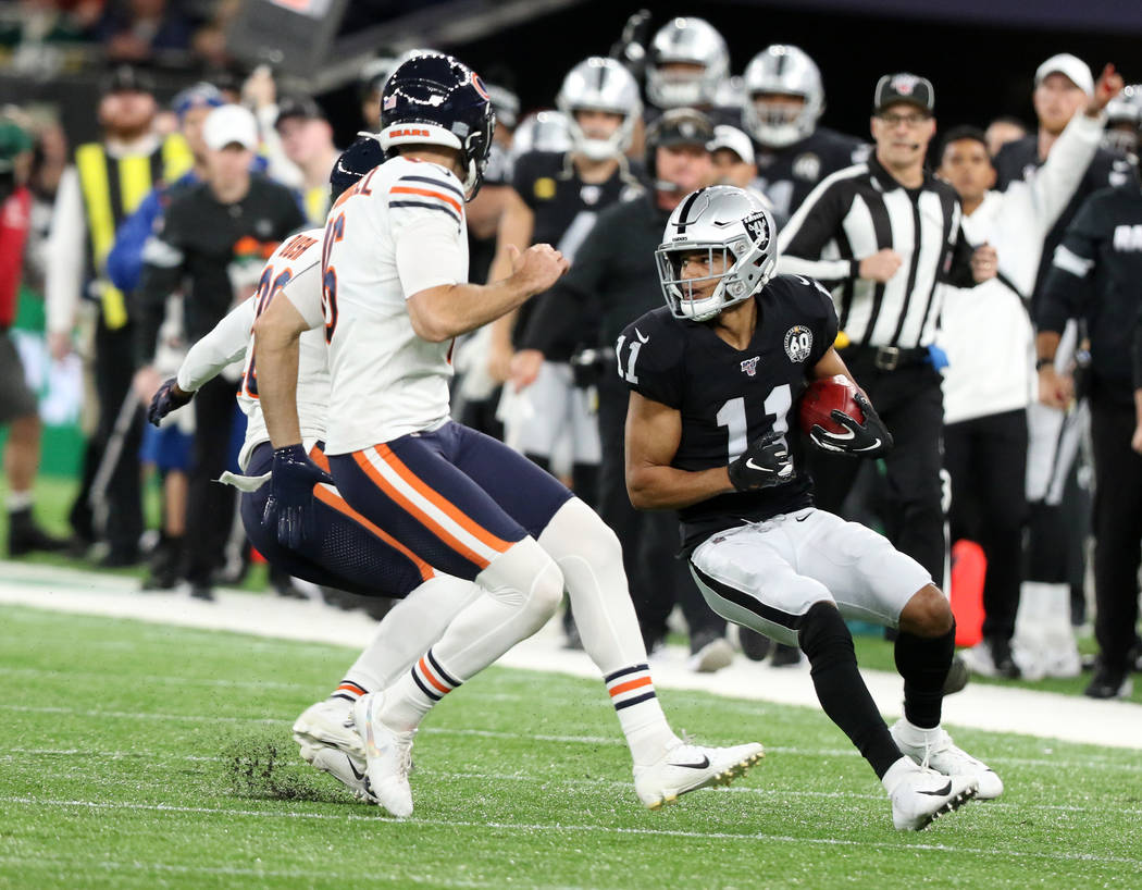 Oakland Raiders wide receiver Trevor Davis (11) looks for room to run on a kickoff return durin ...