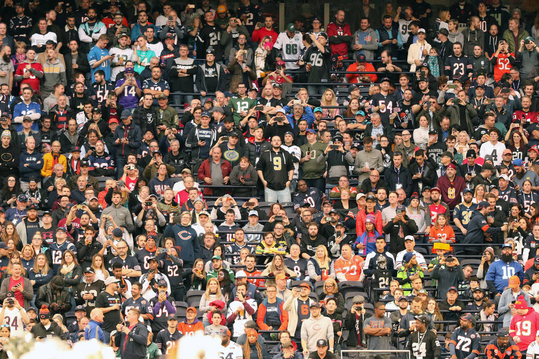 Fans attend an NFL game between the Oakland Raiders and the Chicago Bears at Tottenham Hotspur ...