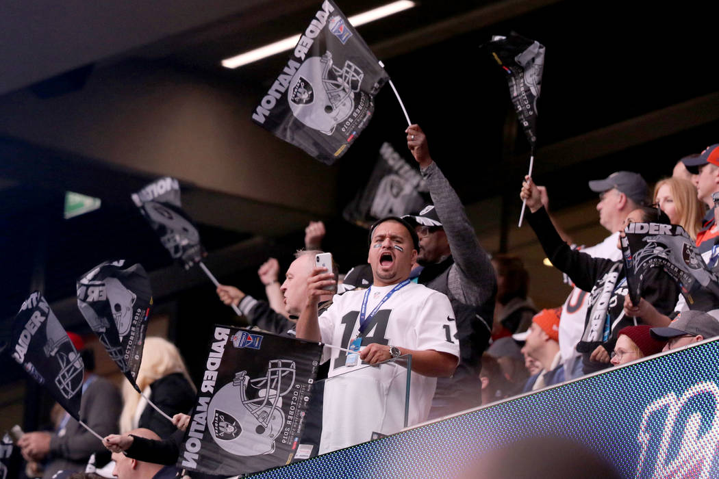 Oakland Raiders fans cheer during an NFL game against the Chicago Bears at Tottenham Hotspur St ...