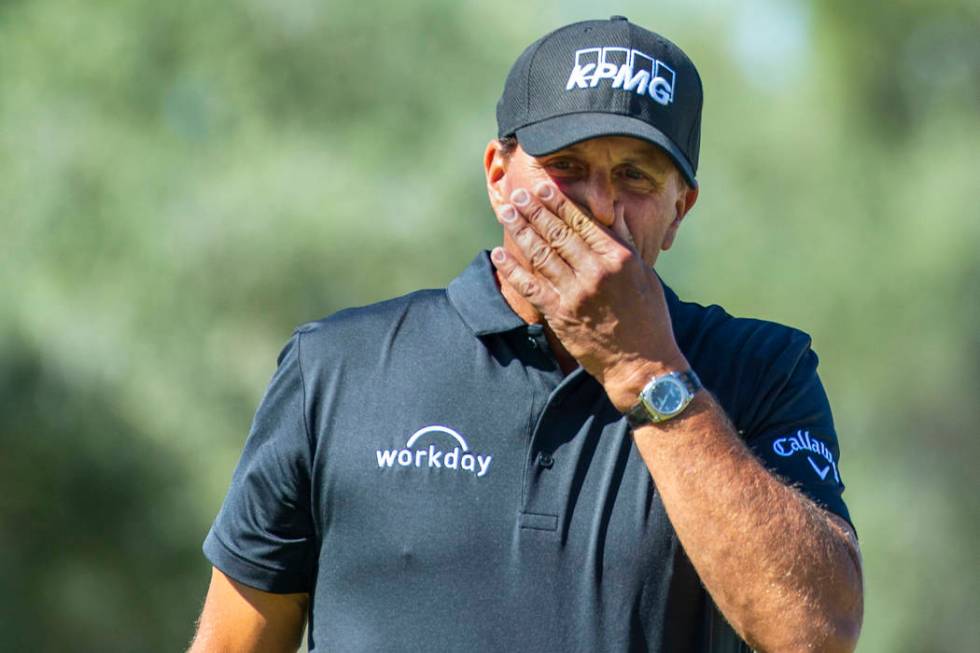 Phil Mickelson reacts to a putt on hole 1 during the third round of Shriners Hospitals for Chil ...