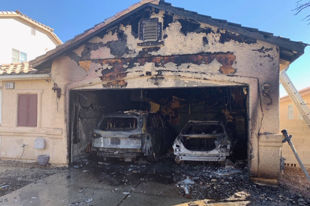 A fire damages a home Sunday, Oct. 6, 2019, on the 6000 block of Dewberry Court in Las Vegas. ( ...