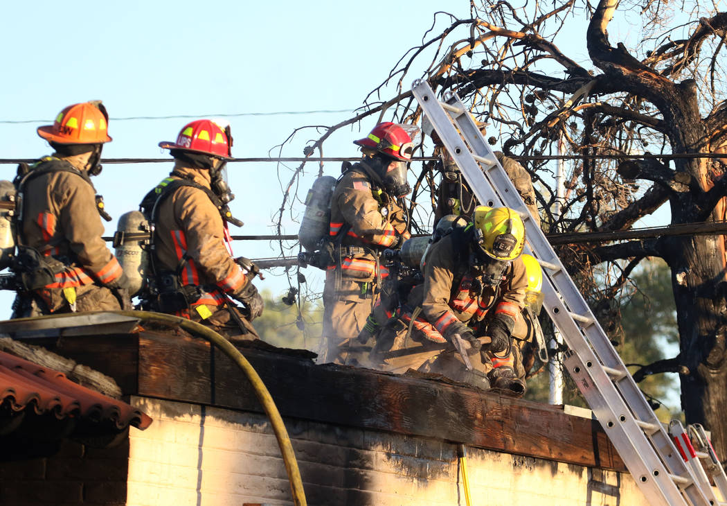 Clark County and Las Vegas firefighters battle a fire in a commercial area at 824 E. Sahara Ave ...