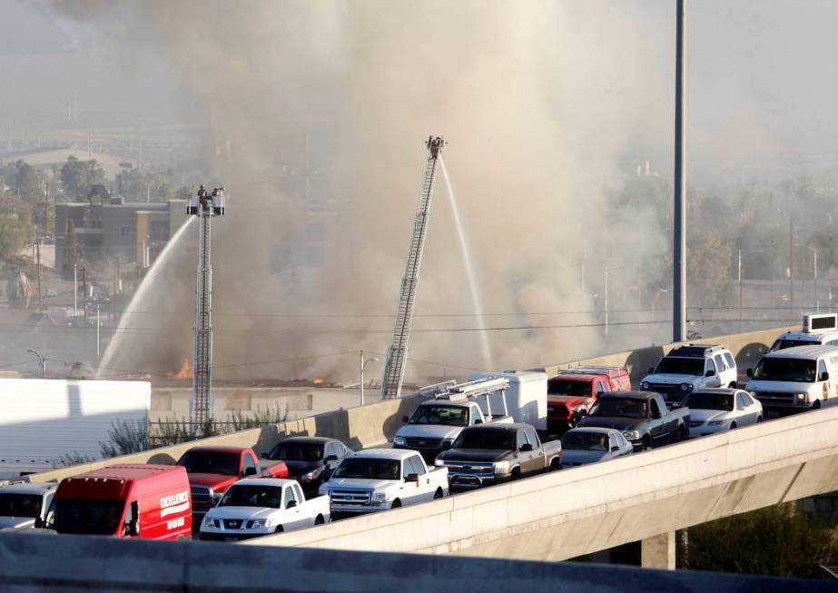 North Las Vegas firefighters battle a two-alarm blaze at 900 W. Bonanza Road, the old site of t ...