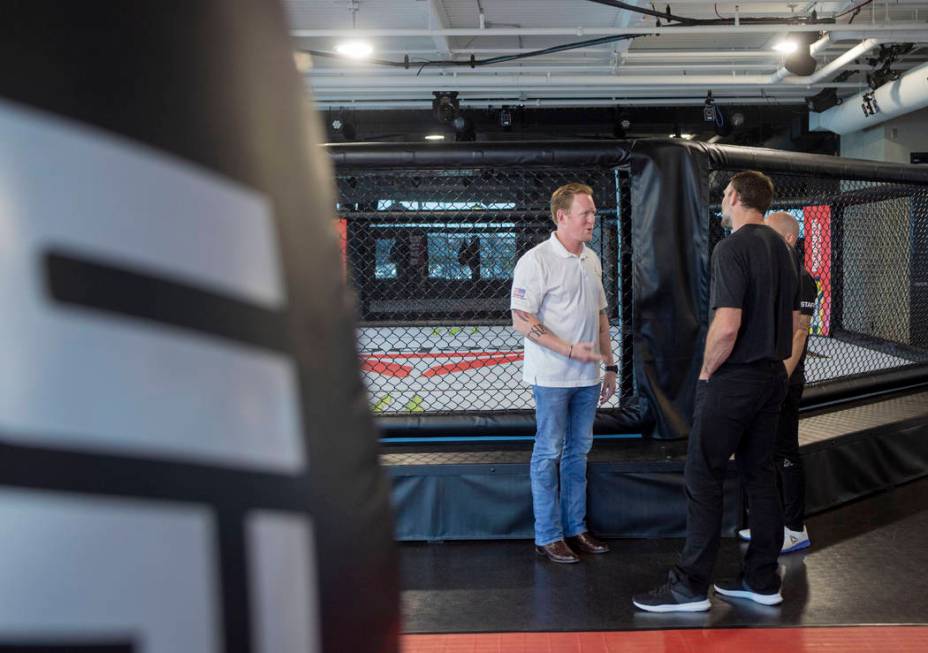 Former SEAL Team Six leader, Rob O'Neill, left, and UFC Hall of Famer Forrest Griffin meet at t ...