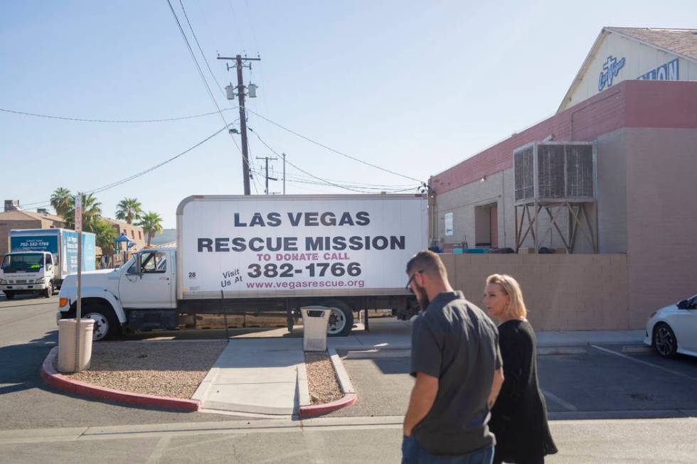 Pastor Brandan Thomas from Winchester Rescue Mission in Virginia, left, and Heather Engle, CEO ...