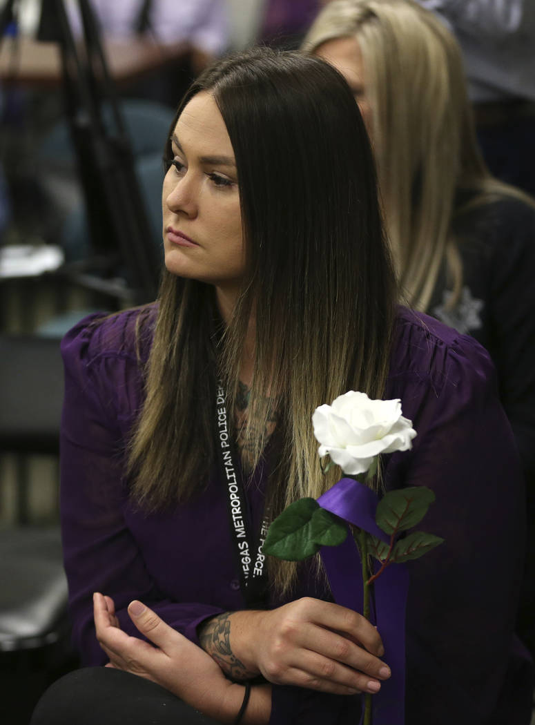 Shema Dannatt, victim advocate for the Rape Crisis Center, participate during a domestic viole ...