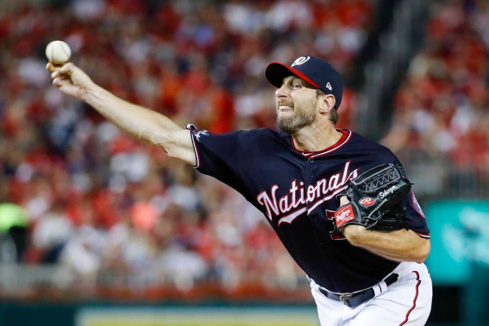 Washington Nationals starting pitcher Max Scherzer throws against the Los Angeles Dodgers durin ...