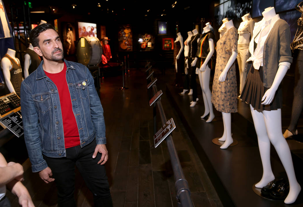 Hard Rock exhibition coordinator Beau Dobney talks about outfits of female rock stars, includin ...