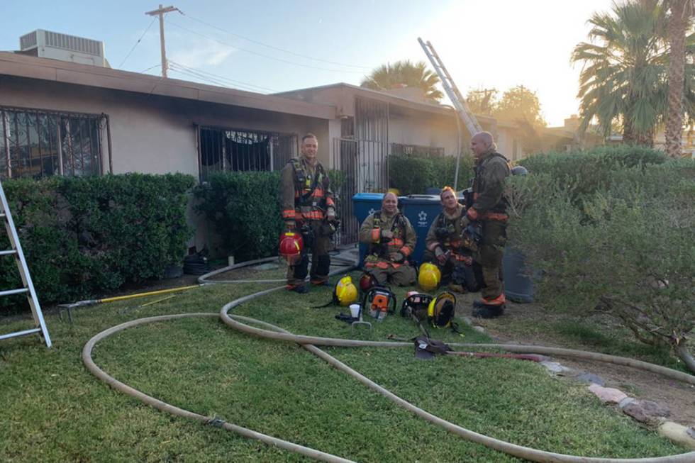 Crews battle a fire Tuesday, Oct. 8, 2019, on the 4500 block of Palmdale Court in Las Vegas. (C ...