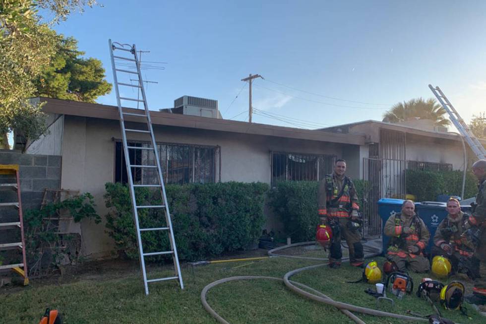 Crews battle a fire Tuesday, Oct. 8, 2019, on the 4500 block of Palmdale Court in Las Vegas. (C ...