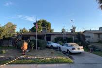 Crews battle a fire Tuesday, Oct. 8, 2019, on the 4500 block of Palmdale Court in Las Vegas. (C ...