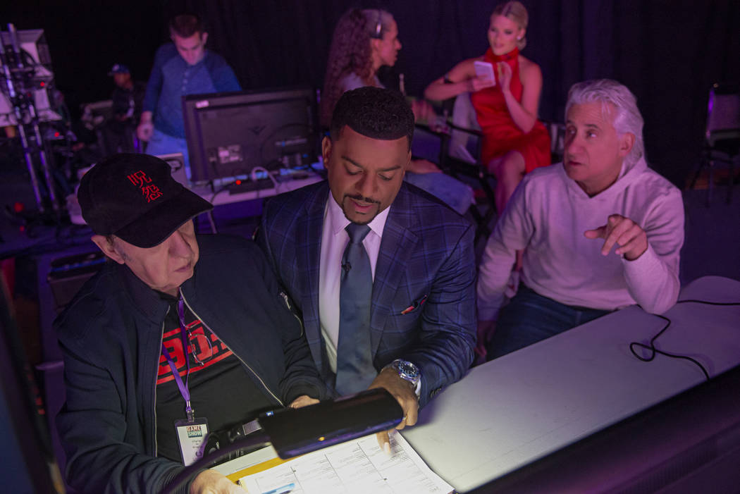 Host Alfonso Ribeiro discusses the game show "Catch 21" during a break in production at Caesars ...