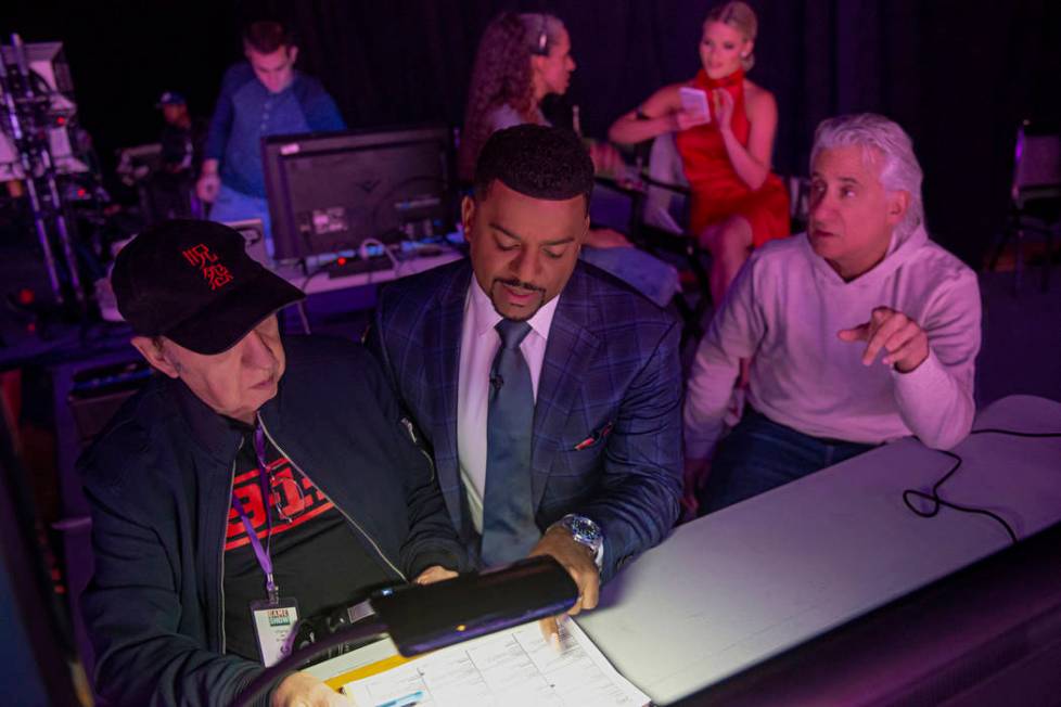 Host Alfonso Ribeiro discusses the game show "Catch 21" during a break in production at Caesars ...