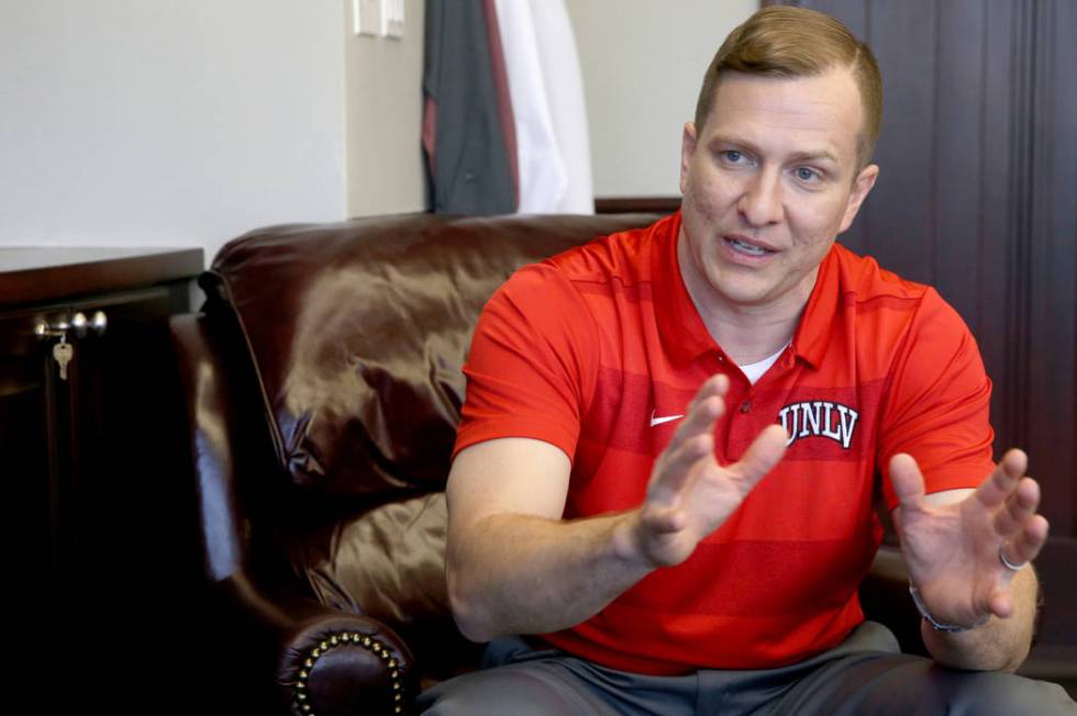 New UNLV basketball coach T.J. Otzelberger talks to a reporter in his office at the Thomas &amp ...