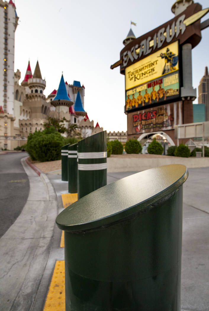 Various sizes of bollards are seen near an exit onto Las Vegas Boulevard South at the Excalibu ...
