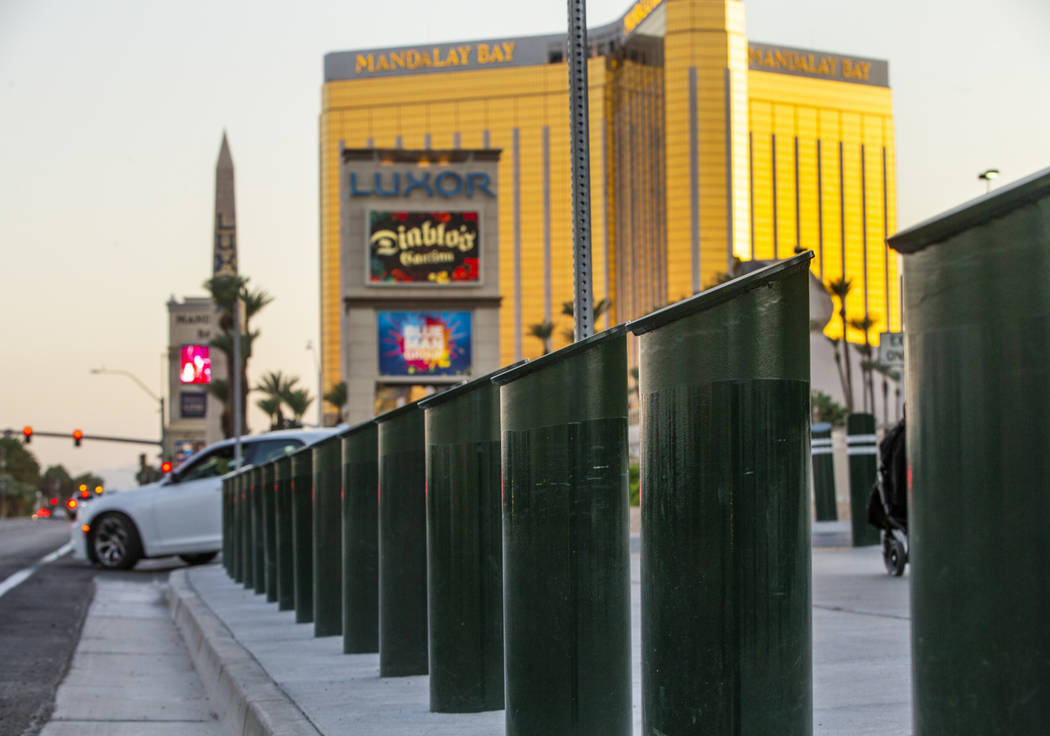 A shortened row of bollards are seen near an exit onto Las Vegas Boulevard South at t ...