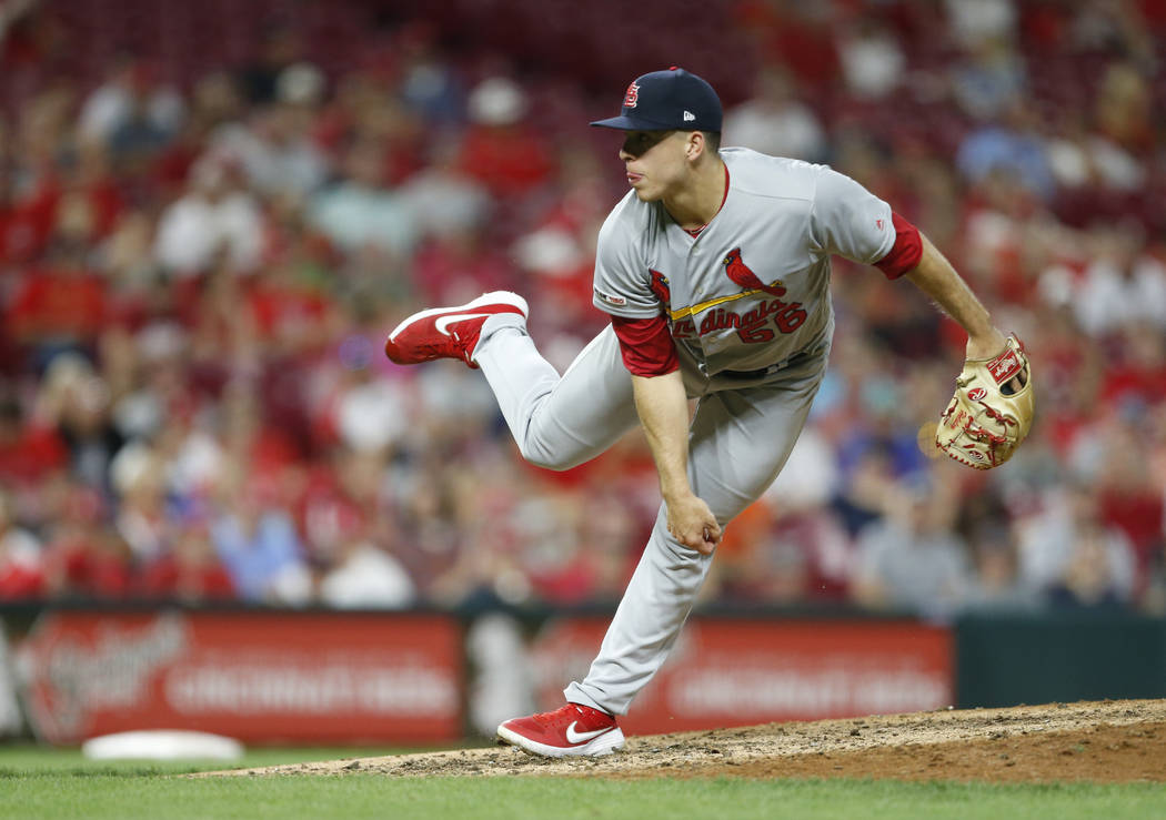 St. Louis Cardinals relief pitcher Ryan Helsley throws against the Cincinnati Reds during the e ...