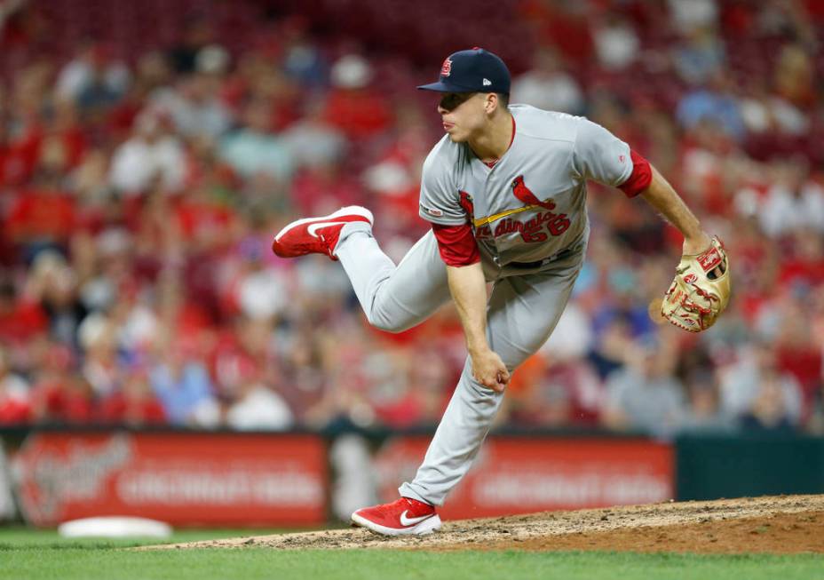 St. Louis Cardinals relief pitcher Ryan Helsley throws against the Cincinnati Reds during the e ...