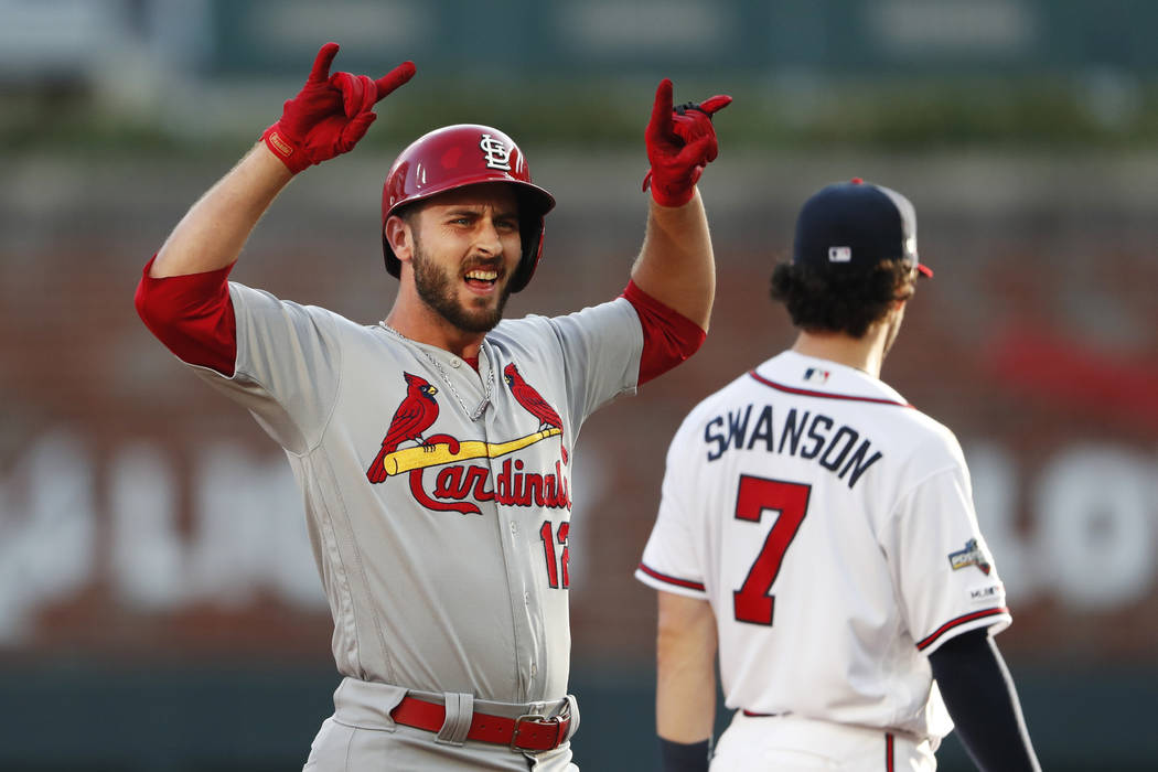 St. Louis Cardinals' Paul DeJong celebrates after hitting a double to score a run in the second ...