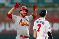 St. Louis Cardinals' Paul DeJong celebrates after hitting a double to score a run in the second ...