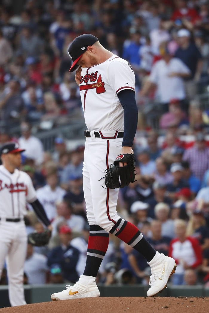 Atlanta Braves starting pitcher Mike Foltynewicz stands on the mound after walking St. Louis Ca ...