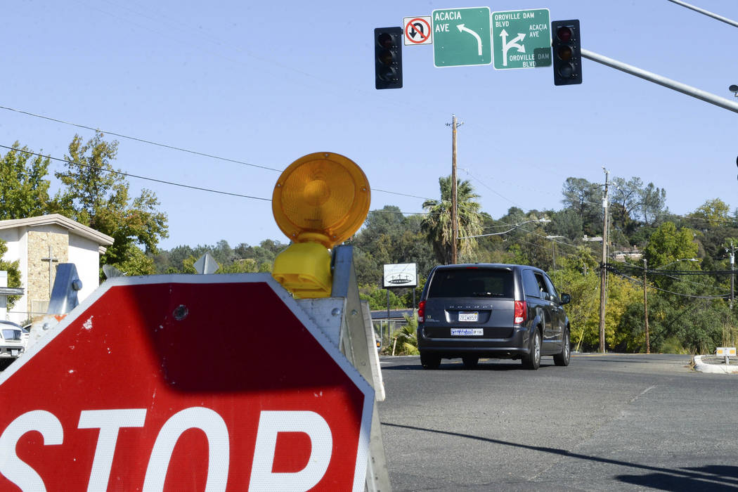 A stop sign is placed at an Oroville Dam Boulevard intersection with no power Wednesday, Oct. 9 ...