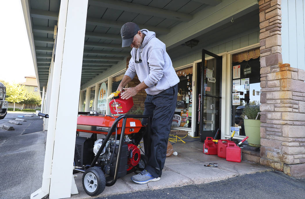 Cliff Dunn, owner of Pawsarotti's pet store, runs a generator in order to keep a freezer full o ...