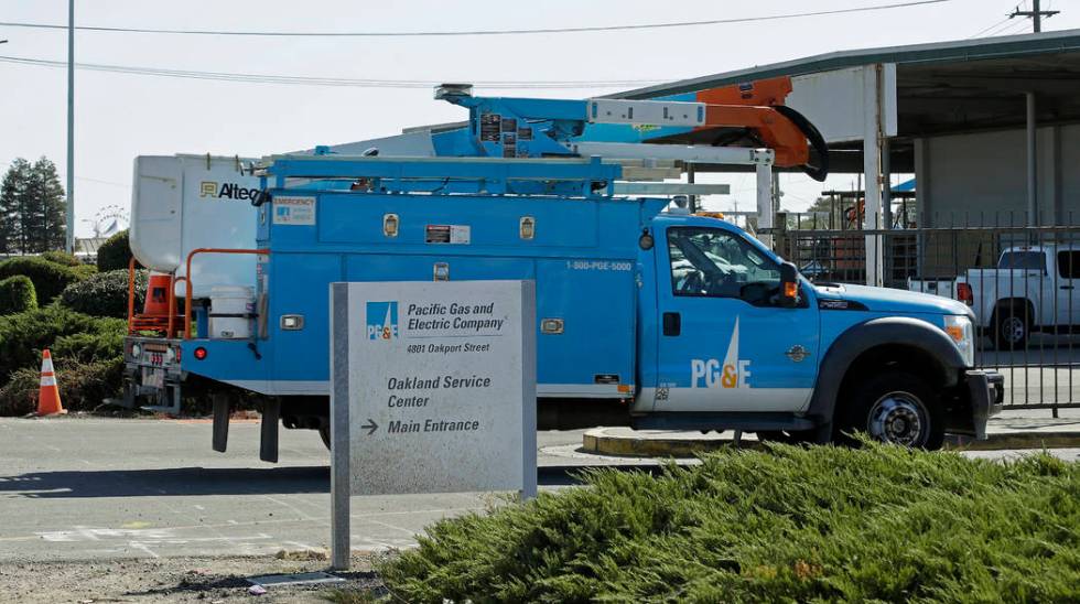 A Pacific Gas & Electric maintenance vehicle pulls into the Oakland service center Wednesda ...