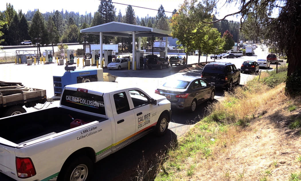 The line for gas stretches around to Nevada City Highway from the Robinson gas station in Nevad ...