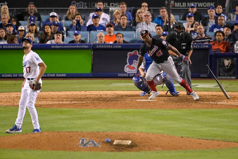 Washington Nationals' Howie Kendrick (47) watches his grand slam off Los Angeles Dodgers relief ...