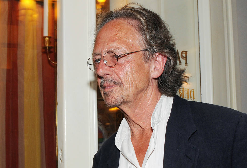 In a Friday Aug. 7, 2009, file photo, Austrian author Peter Handke attends a dress rehearsal of ...