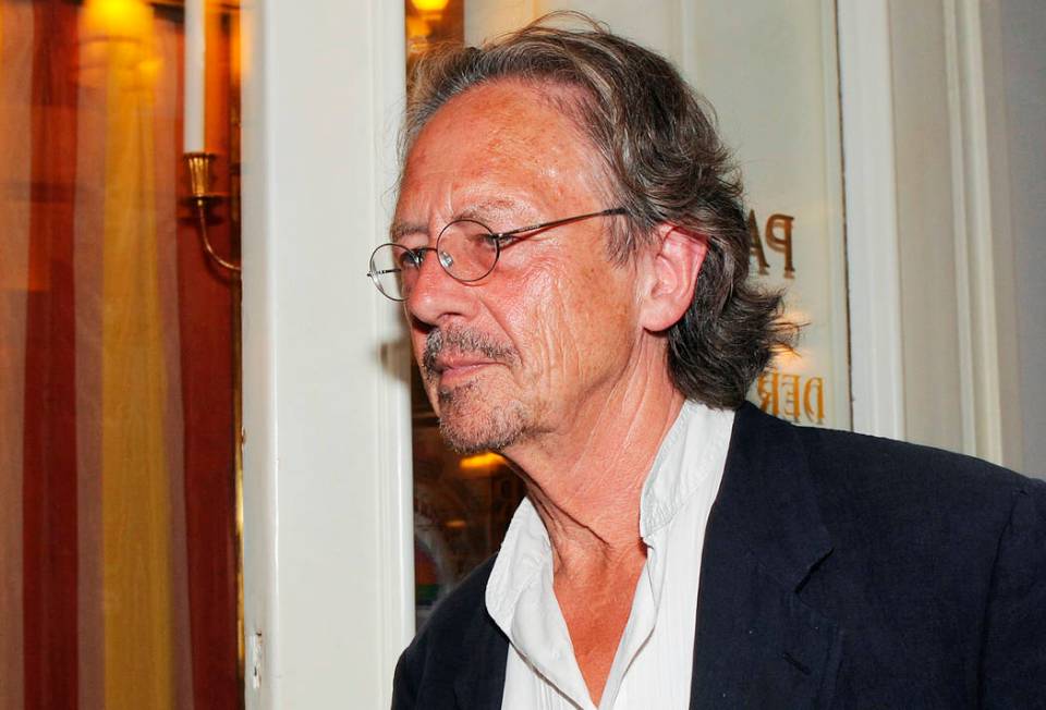 In a Friday Aug. 7, 2009, file photo, Austrian author Peter Handke attends a dress rehearsal of ...