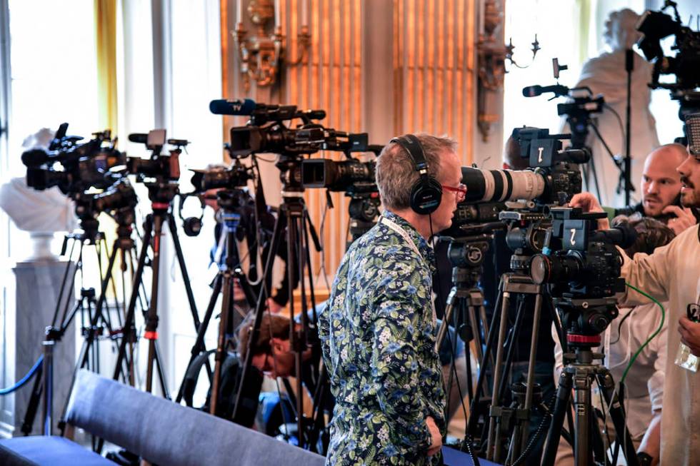 Journalists prepare themselves ahead of the announcement of the winners of the Nobel Prize in L ...