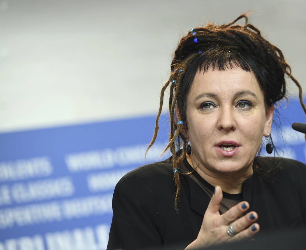 In a Feb. 12, 2017, photo Polish author Olga Tokarczuk spekas during a press conference in Berl ...