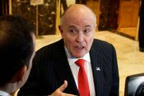A Jan. 12, 2017, file photo shows former New York City Mayor Rudy Giuliani talking with reporte ...