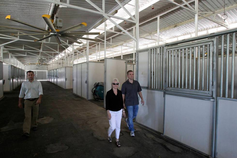 Wayne Newton's former stables are shown in a Aug. 27, 2013. From left is project manager John M ...