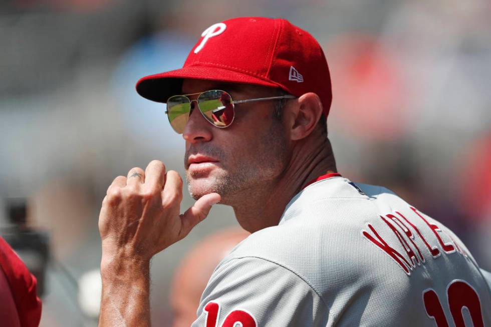 Philadelphia Phillies manager Gabe Kapler (19) watches from the dugout during a baseball game a ...