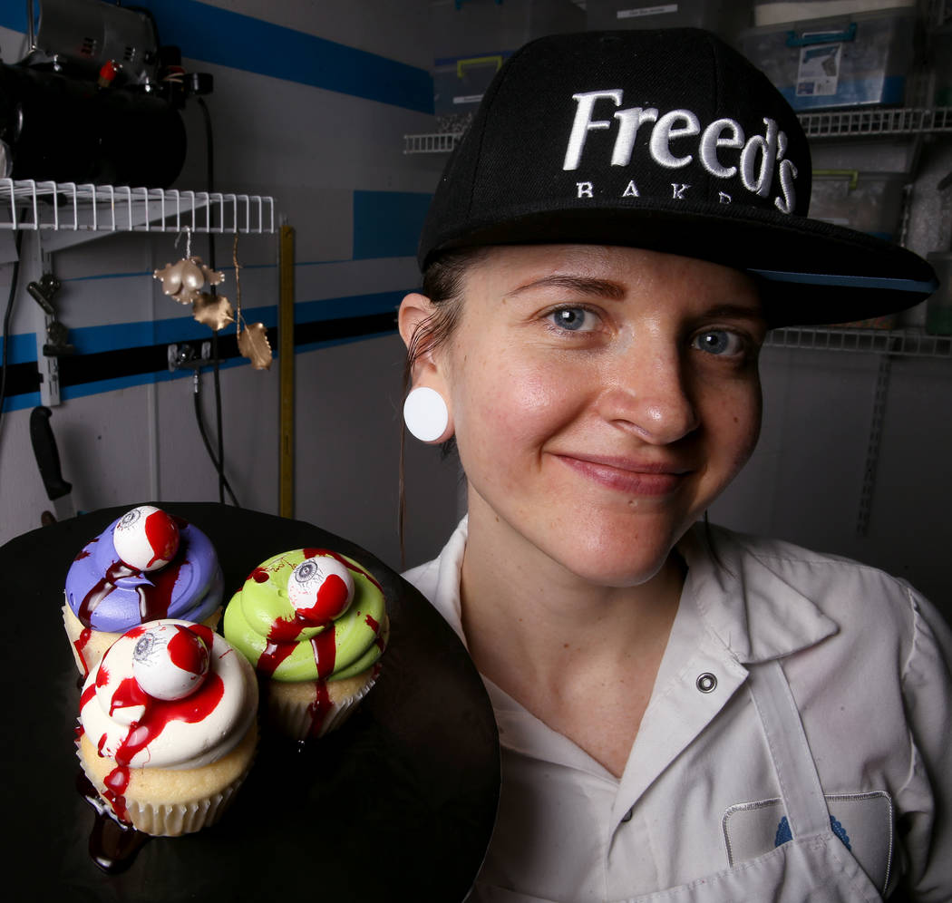 Brittnee Klinger shows off cupcakes, dripping with sweet fake blood.