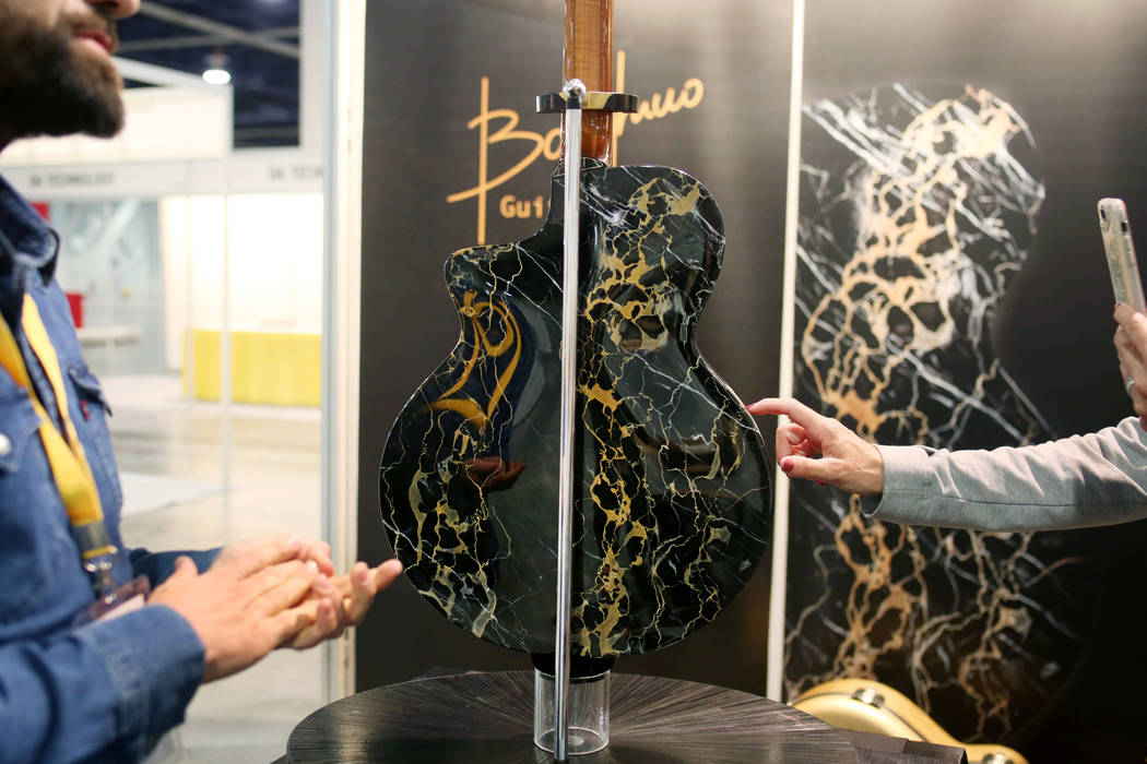 Mirko Borghino's one of a kind luxury handmade guitar made with marble of Italy, displayed for ...