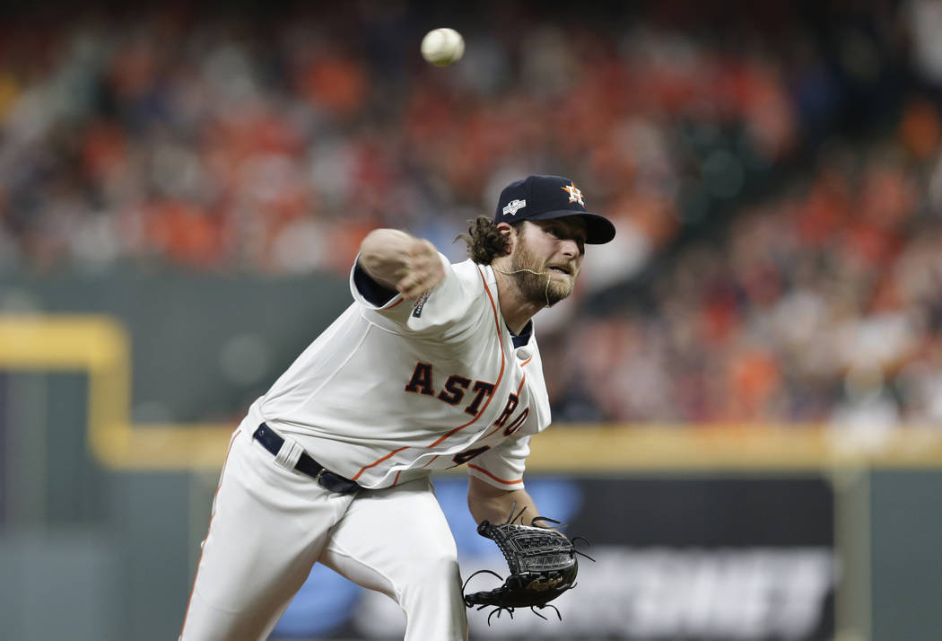 Houston Astros starting pitcher Gerrit Cole (45) delivers a pitch against the Tampa Bay Rays du ...