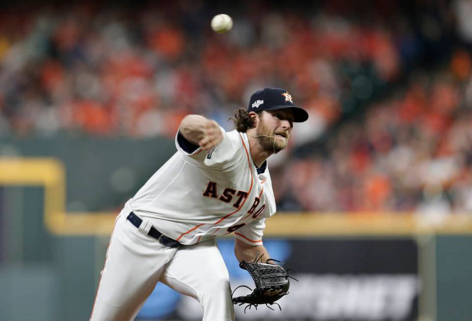 Houston Astros starting pitcher Gerrit Cole (45) delivers a pitch against the Tampa Bay Rays du ...