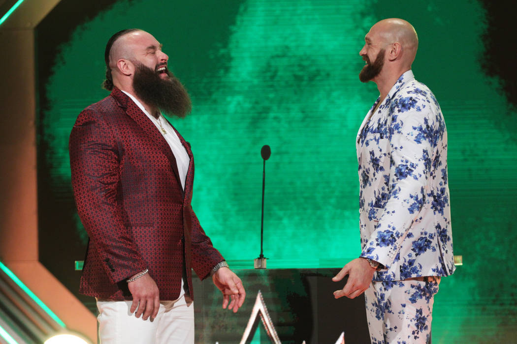 Braun Strowman, left, with Tyson Fury, pose during a World Wrestling Entertainment press confer ...