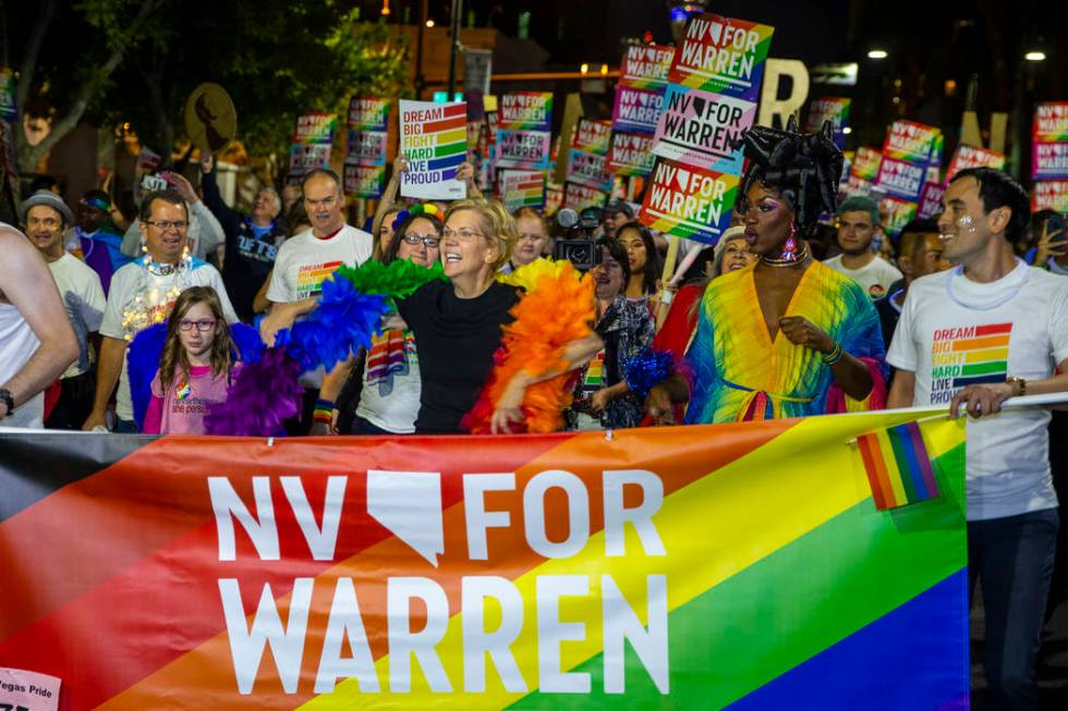 Democratic presidential candidate Sen. Elizabeth Warren, D-Mass., marching in the Pride parade ...